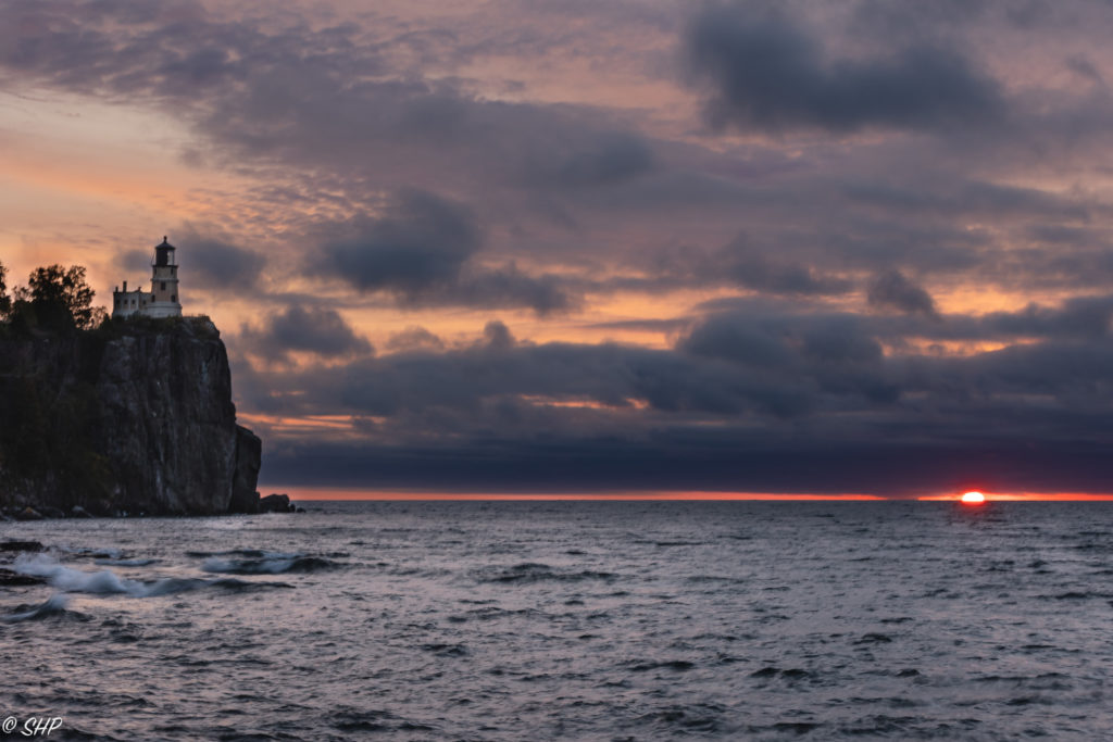 sun cresting horizon at Split Rock Lighthouse